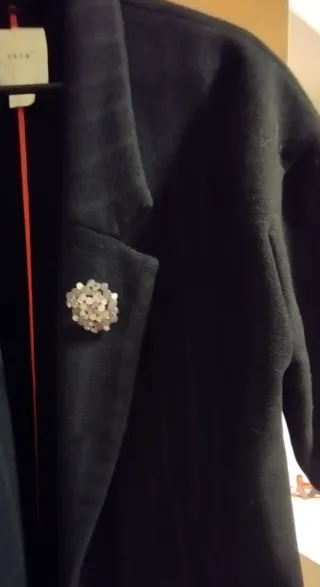 Broche adornado con piedras