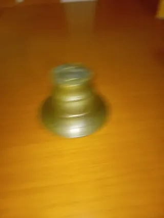 Mortero y mano de bronce