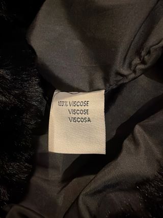 Elegante chaqueta de pelo negra Talla M