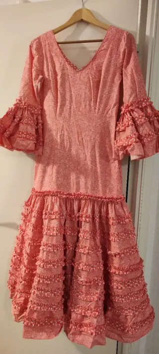 Traje de flamenca rosa volantes