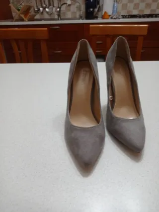 Décolleté donna grigie