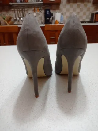 Décolleté donna grigie