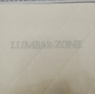 Colchón cuna viscolástico con zona lumbar y funda.