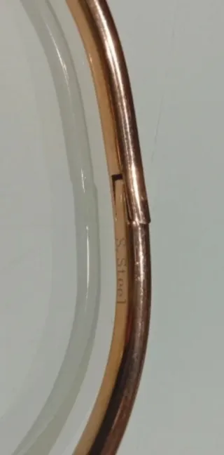 Bracciale rigido modello Cartier in acciaio dorato
