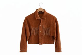 Chaqueta marrón con flecos y pedrería