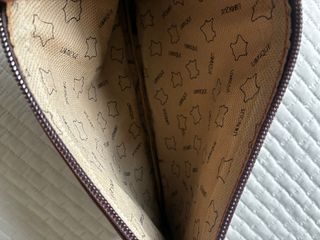 Bolsito de mano Unrique piel azul y marrón