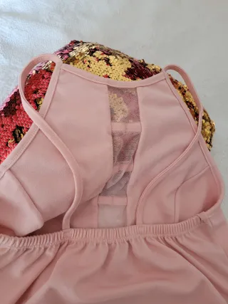 Top rosa con detalles de malla