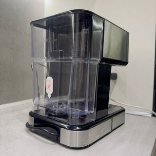 Cafetera (cápsulas y café molido) con vaporizador