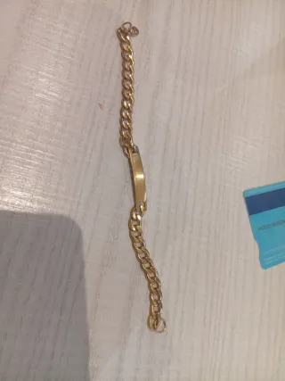 Pulsera de oro con placa