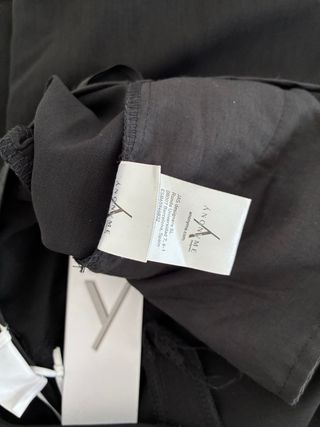 Pantaloni neri a gamba ampia Anonyme