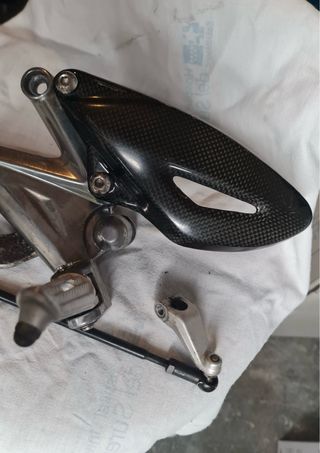 Estribera Izquierda Triumph Street Triple 2012