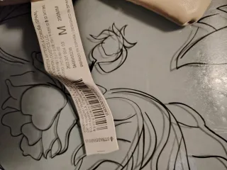 Bolso Stradivarius crema acolchado