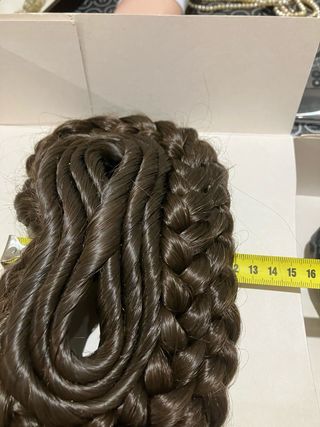 Moño y rodetes fallera castaños.