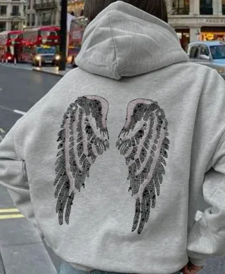 Sudadera con alas de lentejuelas