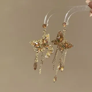 Pendientes vintage mariposa dorados flecos