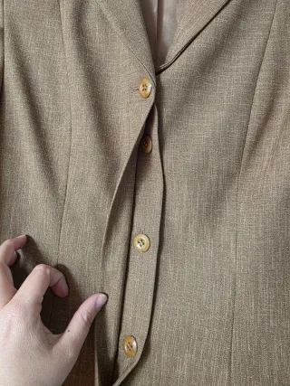 Traje de chaqueta y pantalón marrón