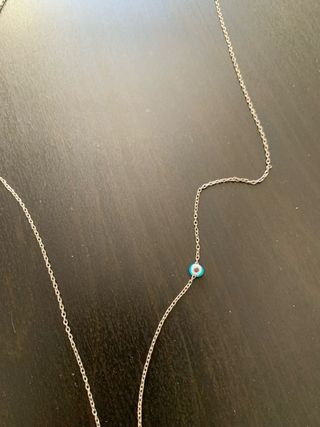 Collana lunga con ciondolo a chiave