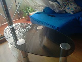 Mesa de sofá de cristal ovalada