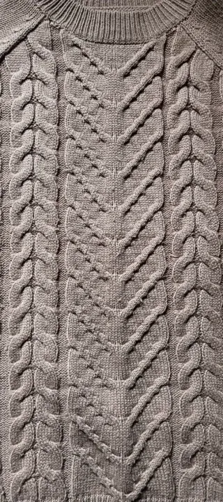 Jersey de punto trenzado color arena