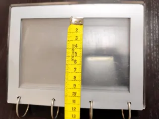 Moldura com capacidade para 12 Fotos