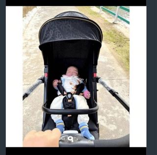 Silla de paseo ligera y plegable