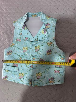 Chaleco fallero azul con flores