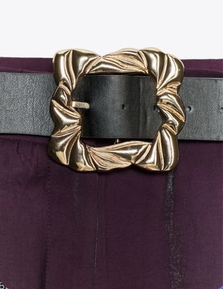 Pantalón satinado cinturón