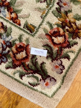 Alfombra rectangular de lana floral