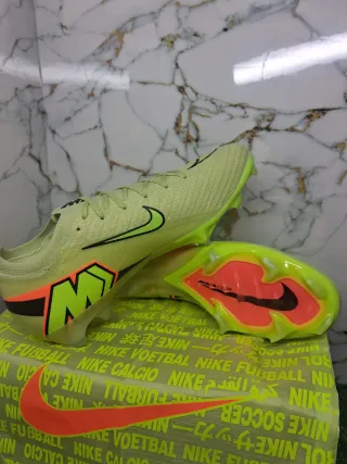 Botas de fútbol  Air Zoom verdes y naranjas