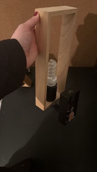 Apliques de pared de madera y color negro