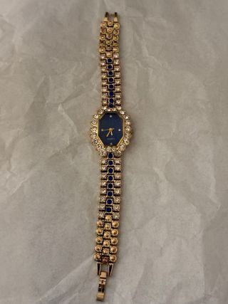 Reloj Octogonal con Cristales Azules y Dorados
