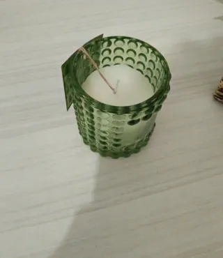Candela in vetro verde puntinato