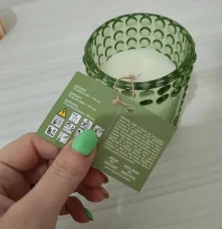 Candela in vetro verde puntinato