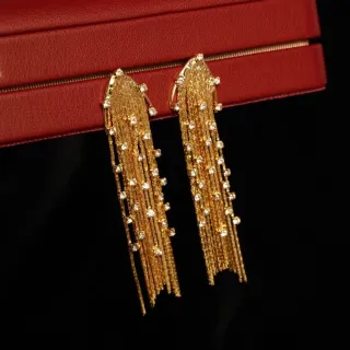 Pendientes largos dorados con pedrería