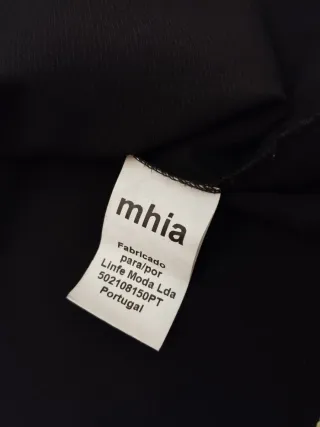 Blusa negra con escote cruzado