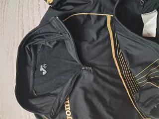 Sudadera Joma Negra y Dorada Media Cremallera