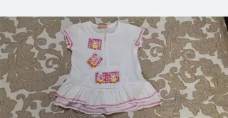 Vestido niña blanco con cremallera y volantes