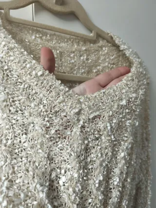 Jersey cuello en pico lentejuelas