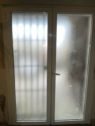 Ventanal y rejas de seguridad