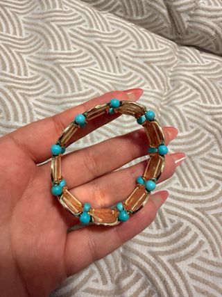 Pulsera Parfois dorada con turquesa