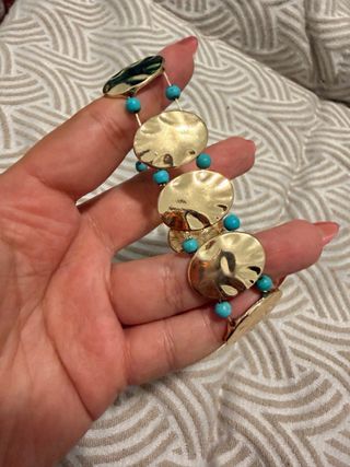 Pulsera Parfois dorada con turquesa