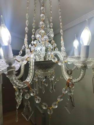 Lámpara de araña cristal y metal