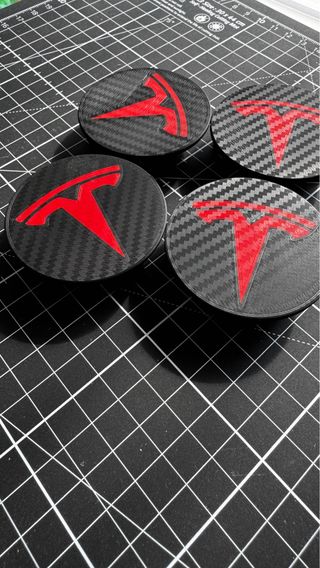 Tapas bujes para TESLA