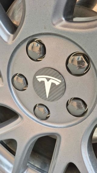 Tapas bujes para TESLA