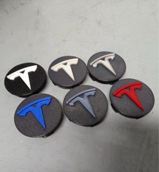 Tapas bujes para TESLA