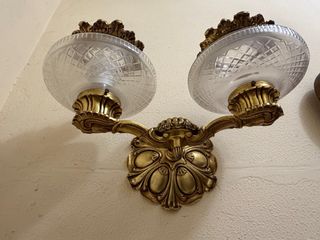 Apliques de pared cristal y metal dorado