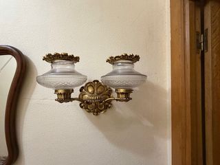 Apliques de pared cristal y metal dorado