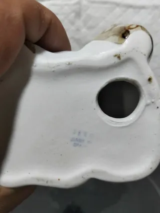 Figura de porcelana mujer con cántaro