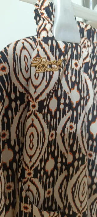 Conjunto blusa y pantalón talla L