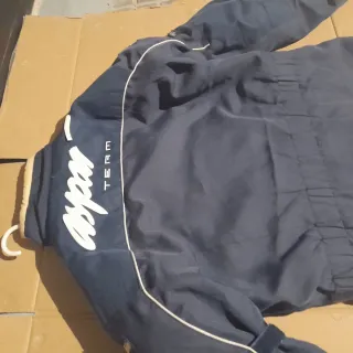 Chaqueta de moto azul con logos